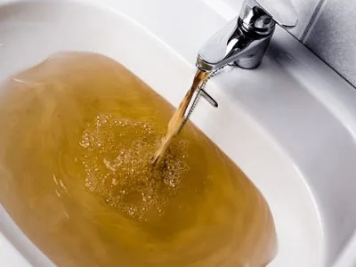 Brown or Rusty Hot Water? Here's What It Means